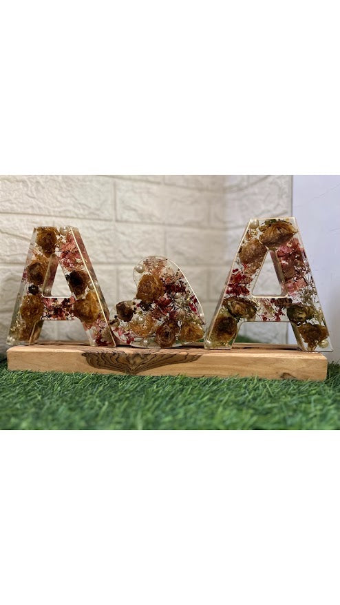 Varmala Initials stand