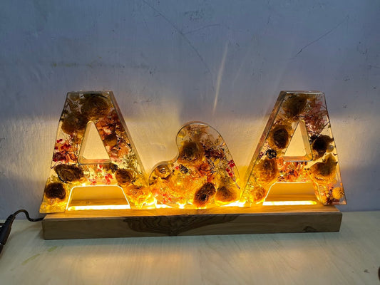 Varmala Initials stand